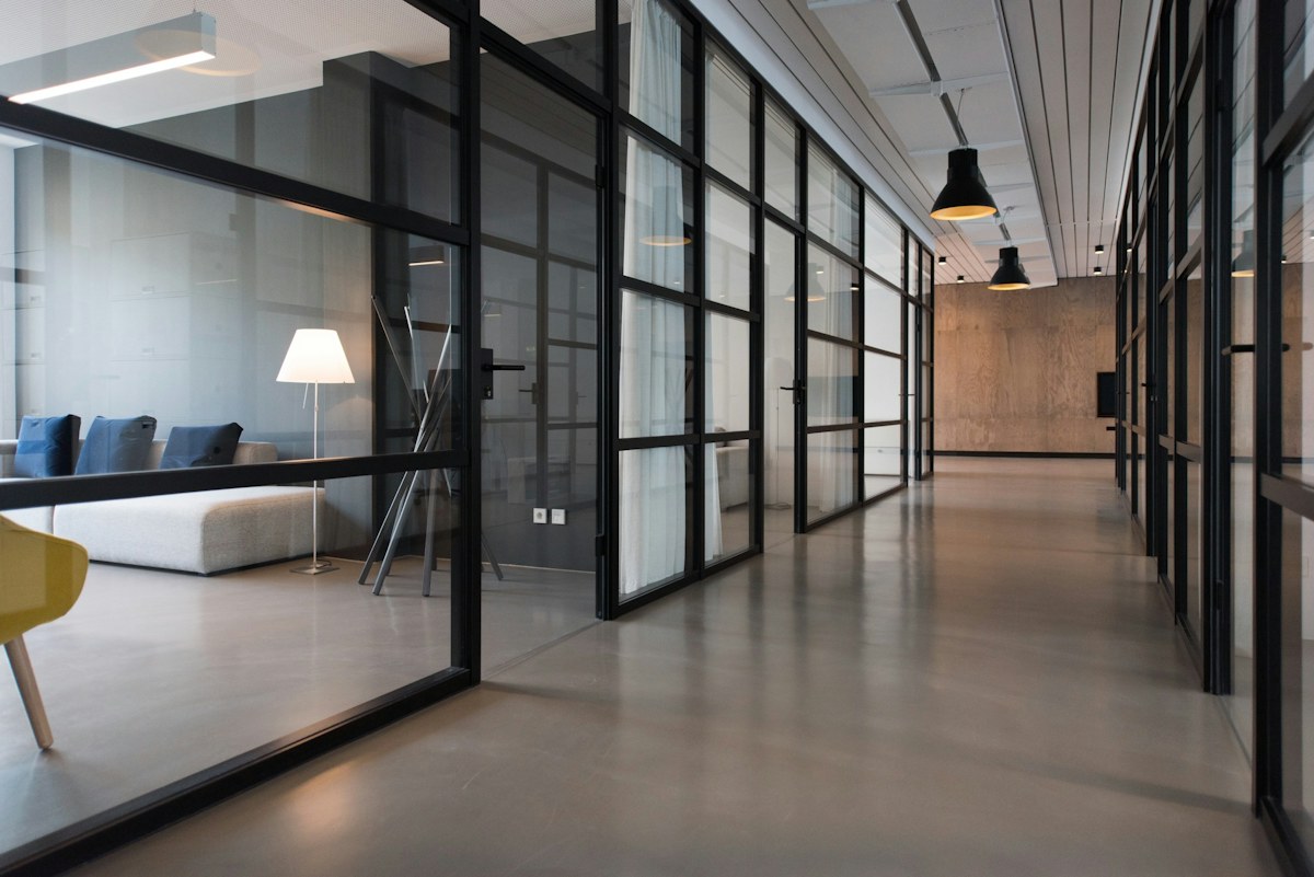 Modern collaborative workspace with laptops and project materials